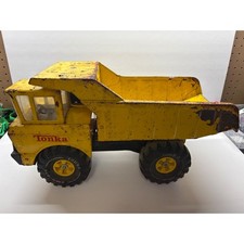 Vintage 1970s Mighty Tonka Dump Truck XMB-975 Pressed Steel Yellow Heavy Duty picture