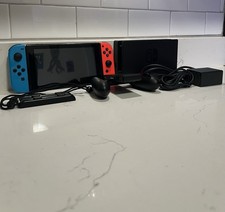 Nintendo Switch 32GB Handheld Console - Blue & Red Joy-Cons With 128 GB SD Card picture