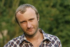 Singer drummer Phil Collins of British rock group Genesis during t- Old Photo picture