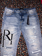 AMIRI Men’s Light Wash Distressed Logo Denim Skinny Slim Fit Jeans picture