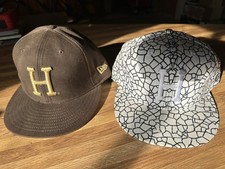A couple of HUF New Era caps from the early 2000's - worn but good condition picture