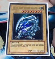 Yu-Gi-Oh Blue-Eyes White Dragon SDK-001 Ultra Rare Holo DMG Shiny Holo foil picture
