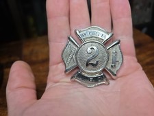 Vintage L. F. D. Fire Department Metal Hat Badge.