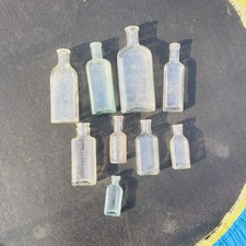 Vintage Beautiful  Lot of 9 Clear Glass Medicine/Apothecary  Antique Bottles picture