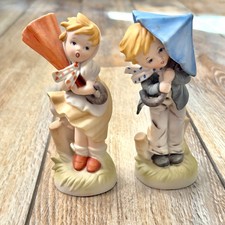 Vintage Windy Rainy Day Umbrella Boy And Girl Figurines picture