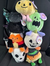 giggle scape plush set. Different colors, all new with tags. Skull, candy, corns picture