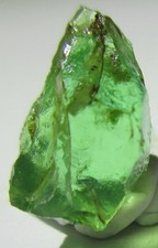 Rare 3.20 ct Tanzanian Neon Green Kornerupine Facet Rough picture