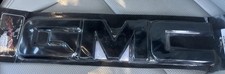 Fits: 2008--2010 GMC Serra  Front Billet Grille Emblem BLACK 96501K AMI USA picture