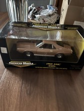American Muscle Elite Edition 1968 AMC AMX 1:18 Scale Gold Limited Edition picture