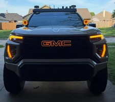 2023-2027 GMC Canyon Illuminated Grille Emblem Amber & White LED Color picture