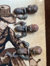 Antique ,industrial baby doll molds . This item is a cast iron (probably bronze) picture