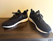 PUMA Women’s Low Top Lace Up Athletic Sneakers Black/White Solid Pattern picture