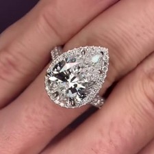4.50 TCW Pear Cut Moissanite Hidden Halo Engagement Ring 14K White Gold Plated picture