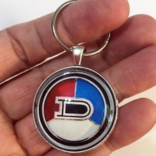 Vintage 1970-73 Datsun 1200 Coupe Grille Emblem 1.2
