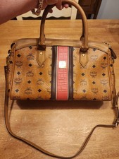 MCM Visetos monogram satchel featuring a distinctive red and brown embossed... picture