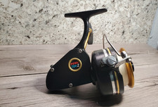 Vintage Penn 704Z Spinfisher Spinning Reel Made in USA Black Gold Front Drag picture