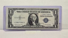 Series 1935G $1 Silver Cert. Star Note (986J)– With Motto & Obverse Misalignment picture
