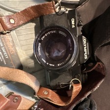 Olympus OM-4 Black SLR Film Camera w/ OM-System Zuiko Auto-S Lens and many lense picture