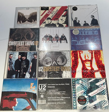 U2 – 12 CD SINGLE / DVD COLLECTION – 1990s–2000s picture