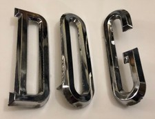 1964-1970 DODGE A100/A108 VAN GRILLE/BACK DOOR EMBLEMS picture