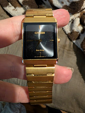 Citizen Eco-Drive Quartz Rectangle Black Dial Gold Tone Stainless Bracelet picture