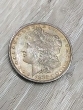 1885 O Morgan Silver Dollar Rainbow Toned AU/UNC Details picture