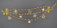 Signed Kirks Folly Light Pink Faux Pearl 3 strand with Star Dangles Bracelet picture