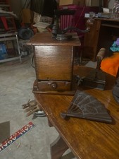 This antique W.W. Waddell Company wooden lap mill coffee grinder picture