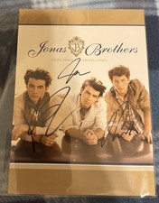 Jonas Brothers Signed Lines Vines and Trying Times Photo 3 Autographs picture