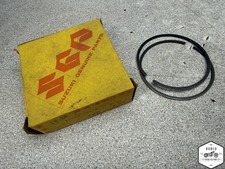 NOS 12140-30010 Suzuki TS250 TM250 GT500 GT750 PISTON RINGS E2-5478.AEN picture