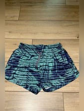 Athleta Girl Running Shorts L 12 Blue Tropical Print Zip Pockets Athletic picture