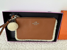 Coach Brown Pebbled Leather Shearling Trim Zip Wristlet w/ Pom Pom Charm picture
