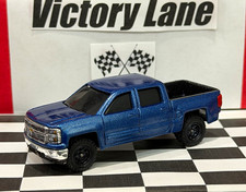 Custom built 2014 Chevrolet Silverado 1500 Off Road Truck Metallic Blue 1/64 picture