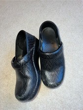 Dansko Black Textured Slip-On Clogs picture