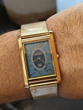 VINTAGE SEIKO SLIM QUARTZ JAPAN MEN'S WORKING DRESS WATCH picture