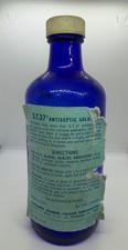 Vintage S.T.37 Antiseptic Cobalt Blue Glass 32 Oz Bottle Calgon Merck Label picture