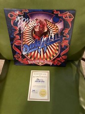 Dokken back for the action lp signed by Don Dokken and George lynch EX picture