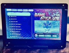 Retro Game Stick featuring thousands of games and 7” monitor picture