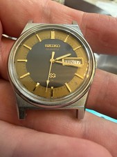 Vintage 1982 Seiko SQ Quartz Day-Date 7123-8439 Grey Gold Two-Tone Dial 35mm picture