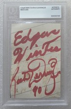 EDGAR WINTER RICK DERRINGER SIGNED CUT BECKETT BAS COA AUTOGRAPHED SLABBED picture