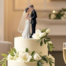 Elegant bride and groom cake topper with veil picture