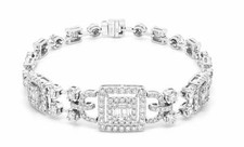 LARGE 4.13CT DIAMOND 18KT WHITE GOLD ROUND & BAGUETTE LOVE KNOT TENNIS BRACELET picture