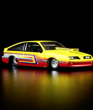 Hot Wheels 1:64 1985 Pontiac J-2000 Diecast Yellow/Red Opening Front End picture