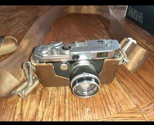 Vintage Canon camera model L1 and case picture