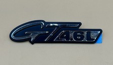 NOS 1996 1997 1997 FORD MUSTANG GT 4.6L FRONT FENDER EMBLEM NEW. picture