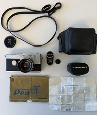 Olympus Pen F half-frame 35mm SLR film camera, light meter, strap, cases manuals picture