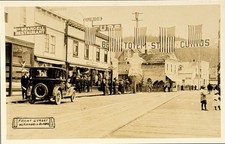 Wrangell Alaska RPPC Postcard Front Street Restaurant Auto Flags Curios picture
