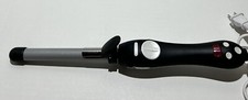 The BEACHWAVER S.75 Ceramic Rotating Curling Iron Dual Voltage Blk/Silver Works picture