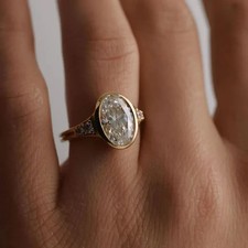 IGI 2.20 Ct Oval-Cut VS2 Lab Grown Diamond Bezel Engagement Ring 14K Yellow Gold picture