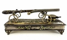 antique Victorian mustache curling iron and heating stand picture
